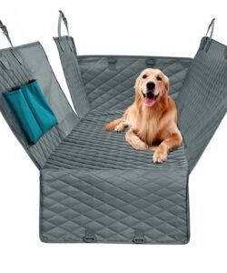 Medium-sized dog comfortably sitting on the car pet seat cover, showing its anti-slip and padded surface