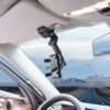360-degree adjustable car phone mount attached to rearview mirror