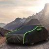 Portable waterproof and UV-resistant car cover fully protecting a sedan vehicle